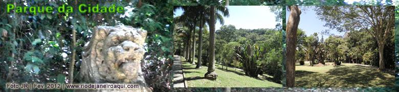 Vista do Parque da Cidade, onde aparece uma escultura, ala de palmeiras e grande gramado ajardinado Vista do Parque da Cidade, onde aparece uma escultura, ala de palmeiras e grande gramado ajardinado